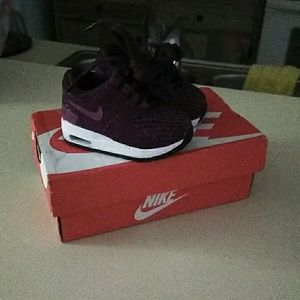 Size 2c Nikes for girls or boys!
